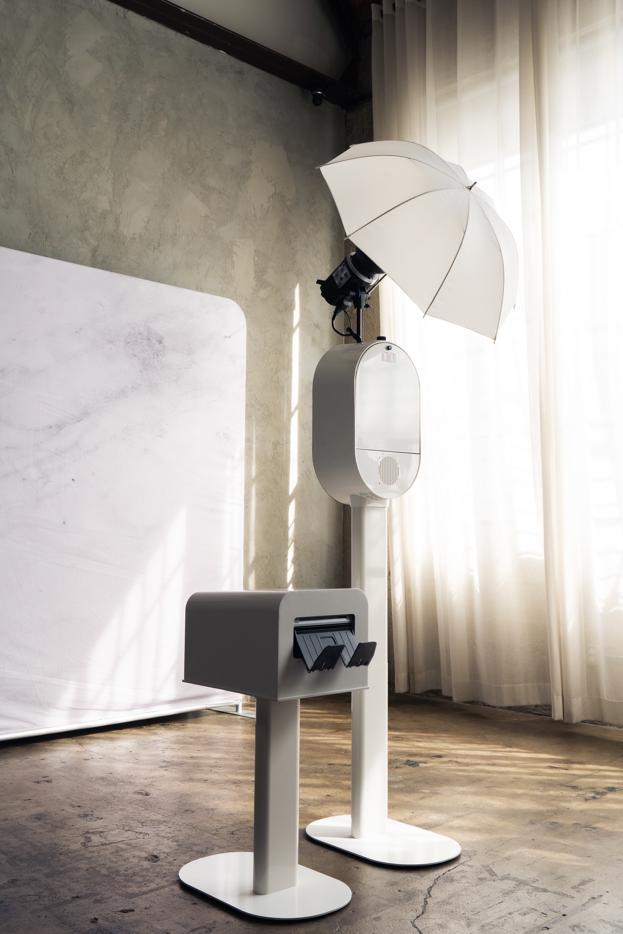 Onyx Photo Booth professional DSLR setup with marble backdrop